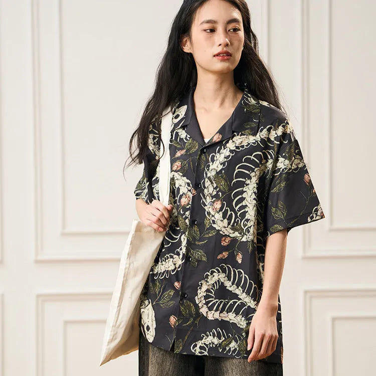 Short sleeve Cuban collar shirt with original snake bone and floral pattern print in a loose fit.
