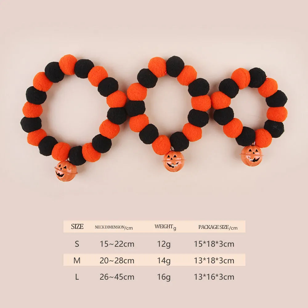 Orange pumpkin Halloween cat collar with green stem on an adjustable strap for pets.