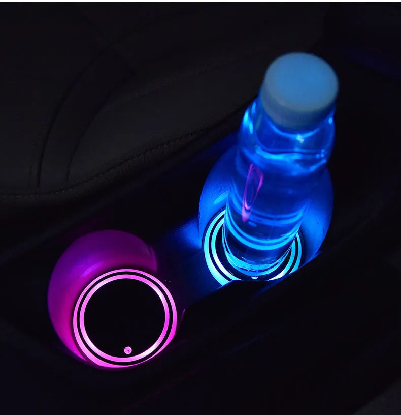 Colourful LED light-up coaster in car cup holder with seven lighting options