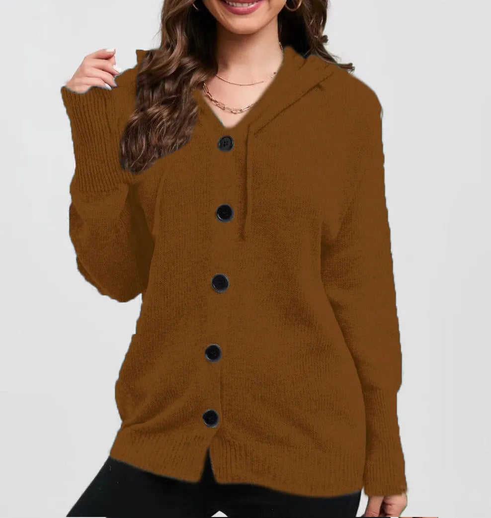 Women's loose fit hooded cotton cardigan sweater in a solid colour with long sleeves.