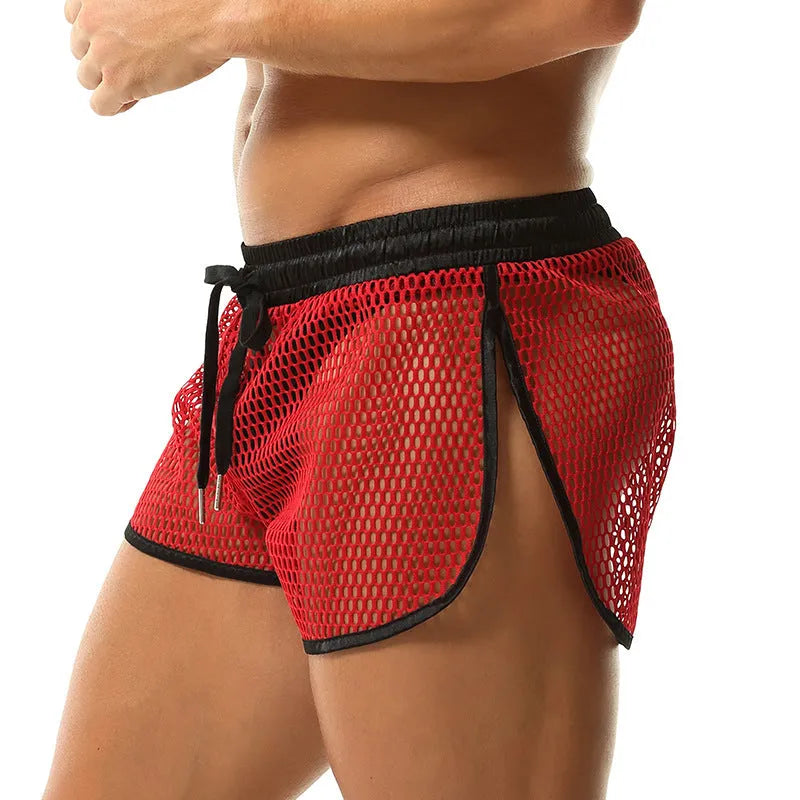 Men's loose breathable polyester boxers in solid colour, black, front view on plain background