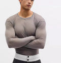 Black slim-fit women's mesh pullover with long sleeves and a see-through texture.