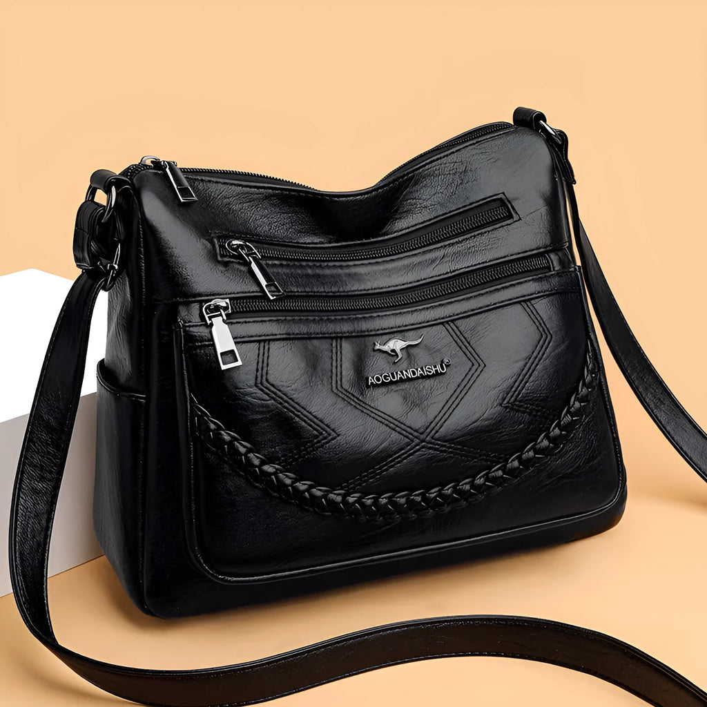 Soft leather large capacity shoulder bag in horizontal square shape with multiple compartments