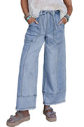 Beau Blue wide leg denim trousers on a hanger, showing drawstring waist, seam detailing, and raw hem.