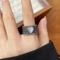 Retro wide-faced heart-shaped adjustable ring in white copper plated silver