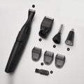 Men's black electric trimmer set with reciprocating head, charging base, and grooming accessories