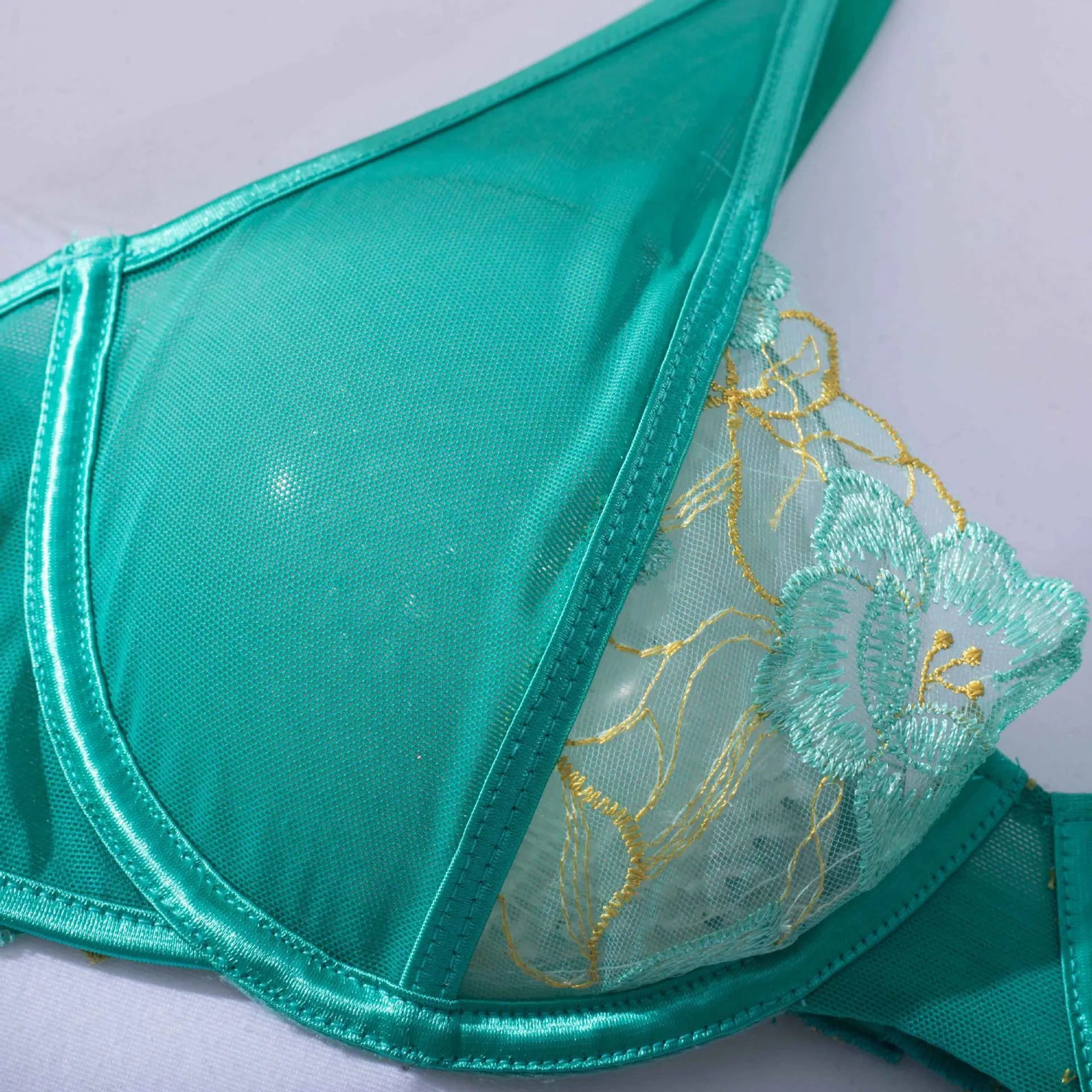 Women's embroidery bra set in light green polyester with three-point bra and matching tights