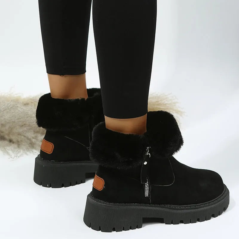 Women's black high-top snow boots with faux suede upper, side zipper, and thick plush lining.
