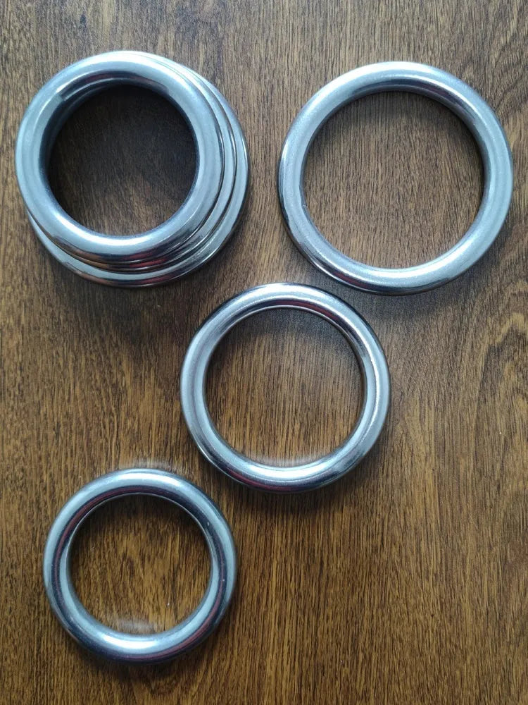 Iron Arm Skill Wing Chun carbon steel training ring shown in three sizes.