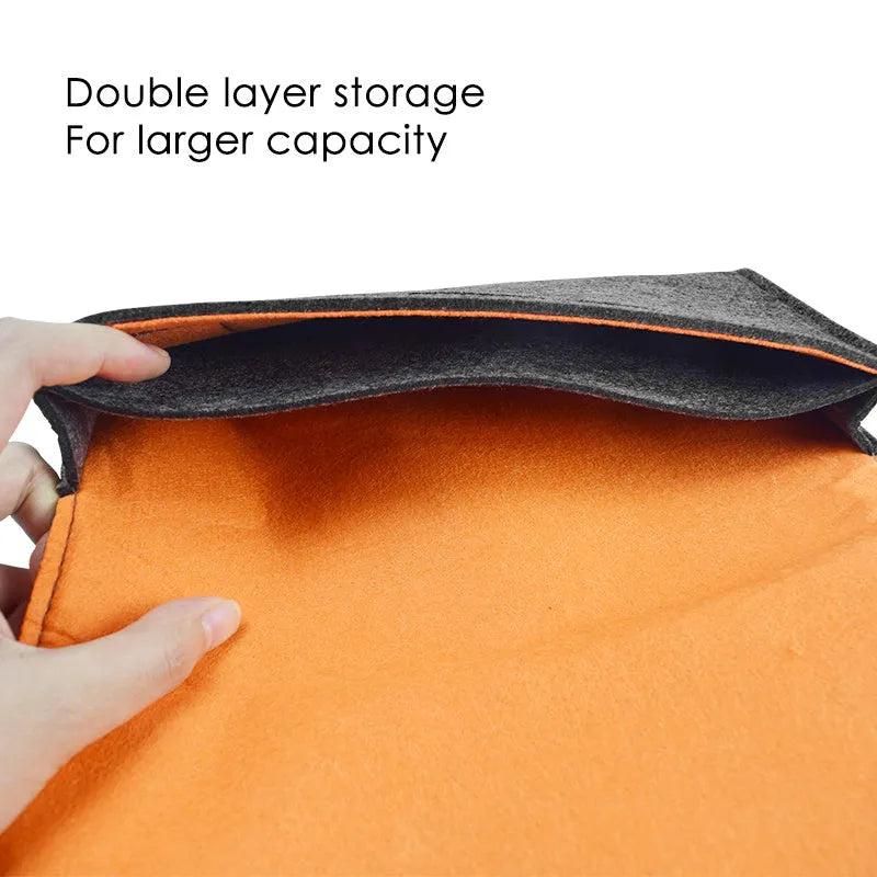 Black felt pouch for Nintendo Switch open to show console compartment and game card slots