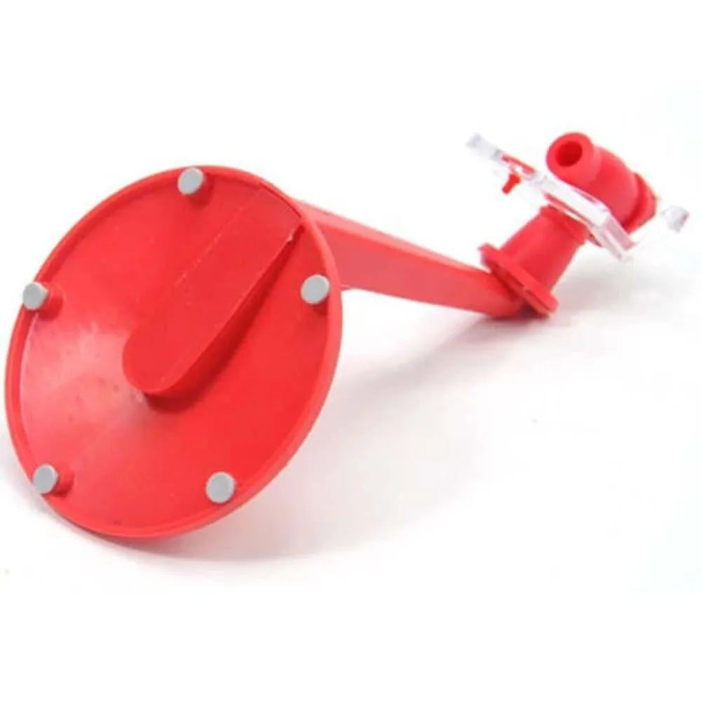 Red plastic Magic Tap soda dispenser mounted on inverted 2-litre bottle