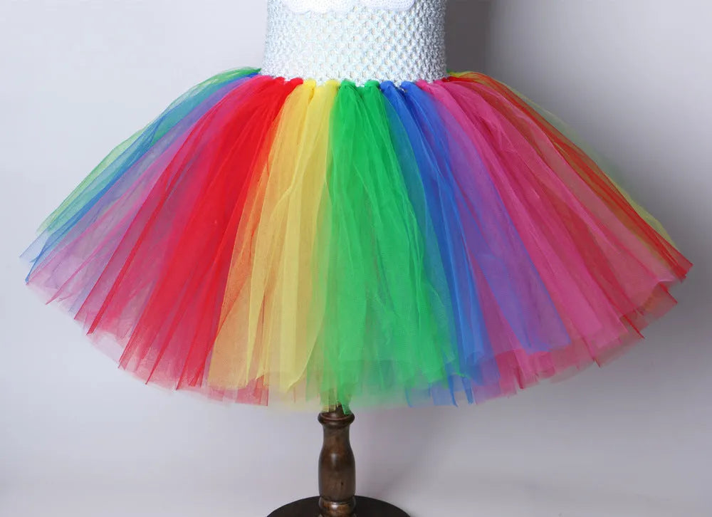 Children's net yarn rainbow show princess dress in sling style with rainbow colour matching, made from nylon and polyester lining.