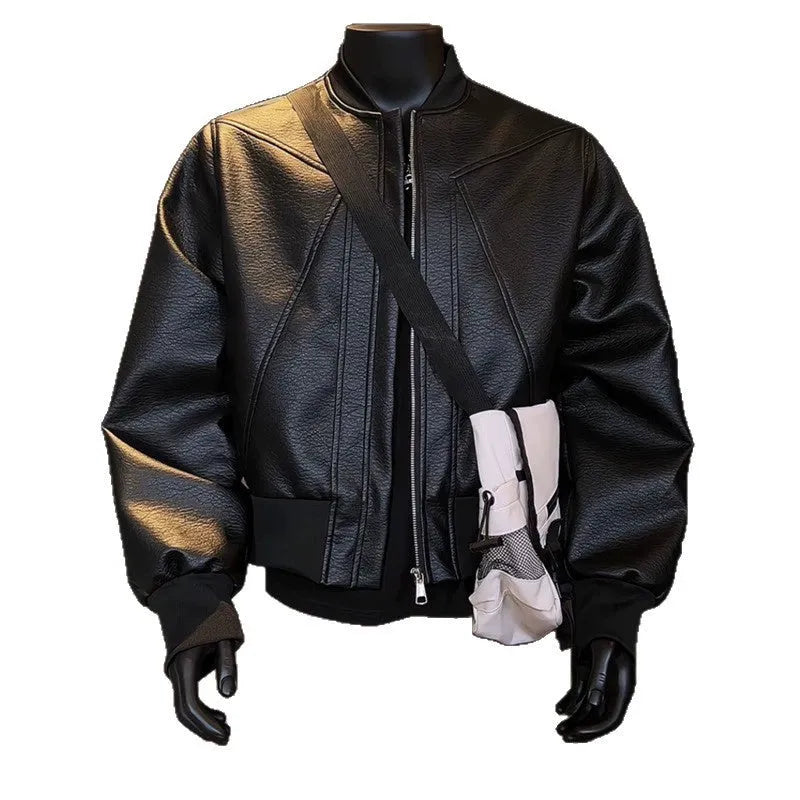 Man wearing a black slim-fit PU leather jacket with litchi pattern texture and extended 100cm length