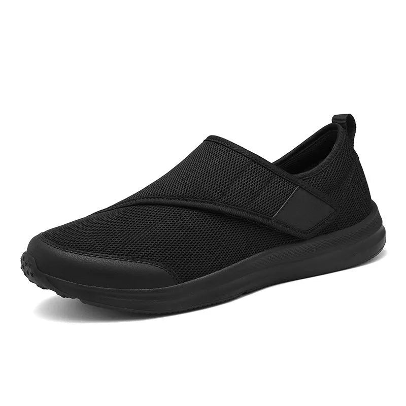 Outdoor mountaineering walking shoes with mesh upper, Velcro closure, and round toe in black