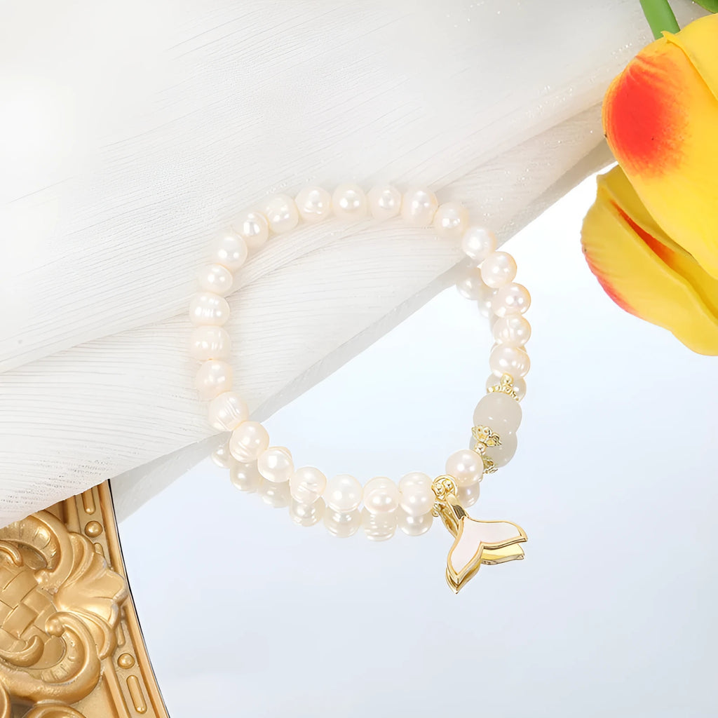 Natural freshwater pearl fishtail bracelet for women, handmade original design on display