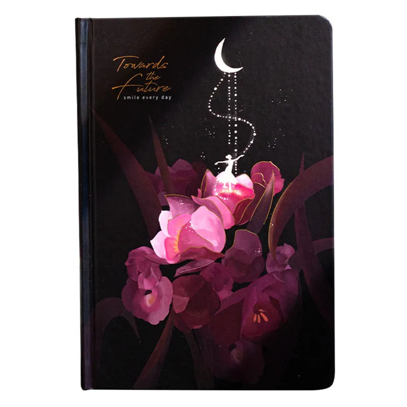 A5 notebook with luminous colourful illustration cover shown in deep blue, gold, light blue, and purple colour options.