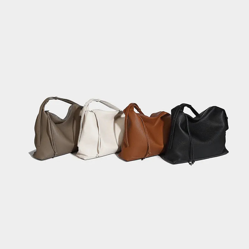 Large capacity underarm shoulder messenger bag in caramel PU leather, 36cm length, with soft texture