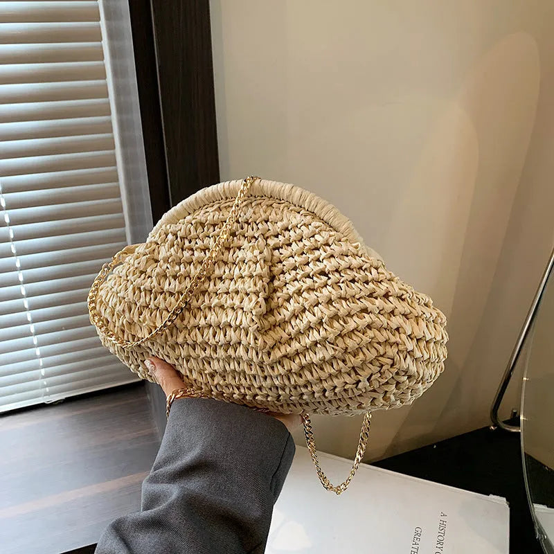 Shell-shaped straw shoulder bag with chain trim in khaki colour