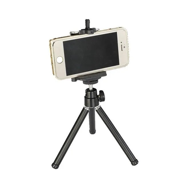 Black universal mini flexible tripod stand with extendable legs and phone clip for cameras and smartphones