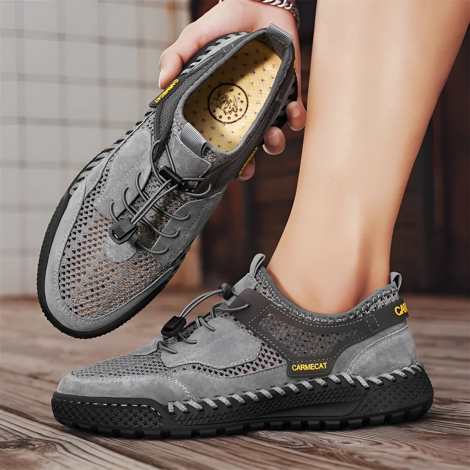 Men's suede low top walking shoes with hand-stitched rubber sole and elastic band in brown color