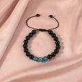 Beaded adjustable luminous bracelet in six colours: black, red, green, pink, blue, sapphire blue, glass or coloured glaze beads, geometric shape