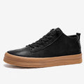 Men's black leather lace-up casual shoes with a round toe and rubber sole on a white background.
