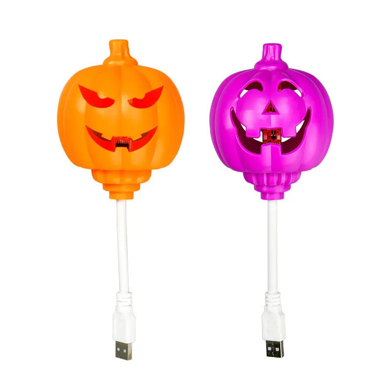Plastic pumpkin lamp with USB cable, purple or yellow light option, 8.3cm wide by 22cm tall
