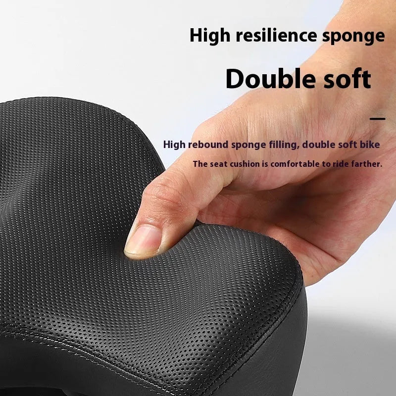 Black bicycle saddle cushion with thick foam padding for shock absorption on mountain bikes