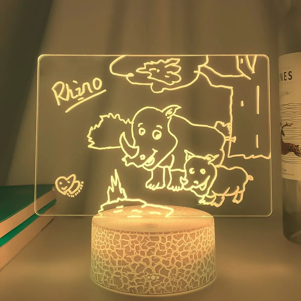 3D acrylic message board with LED lighting and a stylus pen on its illuminated surface