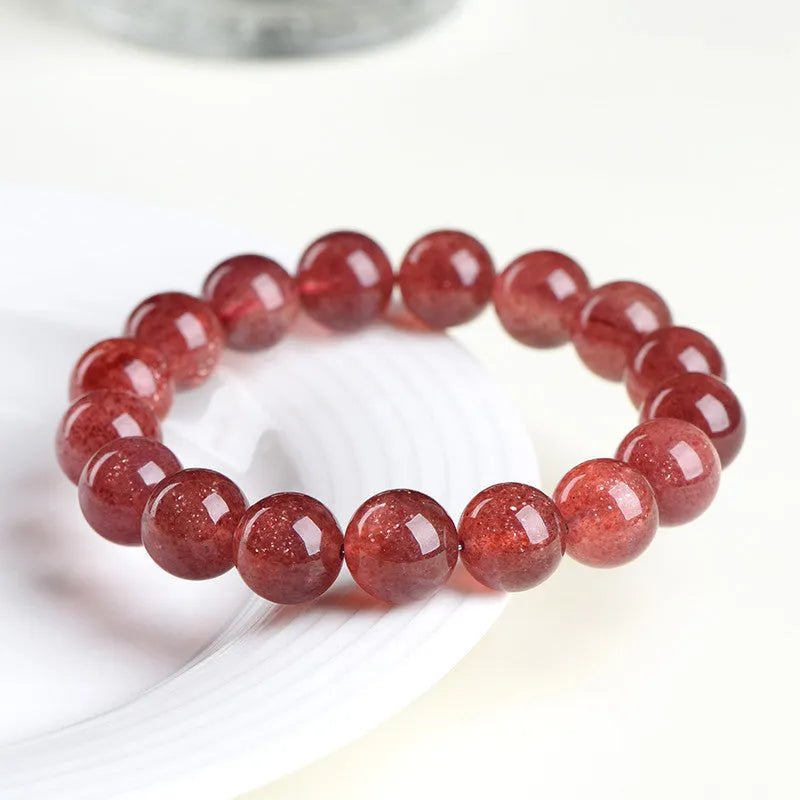 Natural strawberry quartz geometric bead bracelet showing colour and size options for men and women.