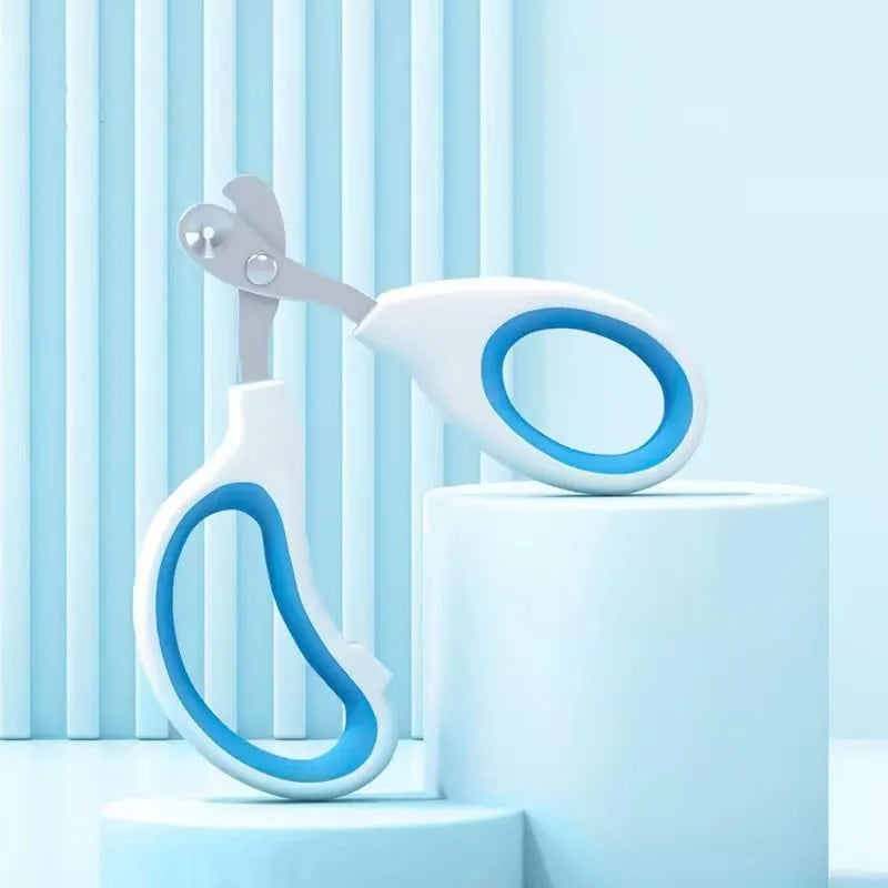 Blue cat nail clippers with circular hole design and cushioned non-slip handle for safe pet trimming