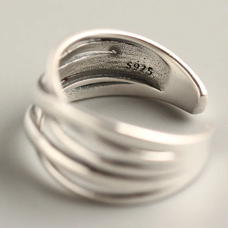 S925 sterling silver vintage weave ring for women, retro silver finish with textured weave pattern on plain background