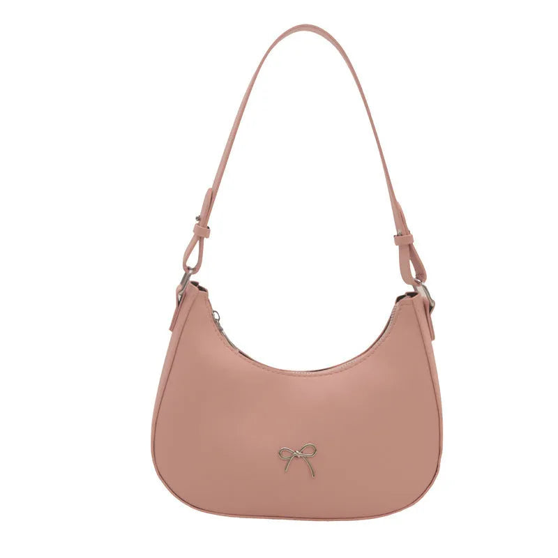 Women's underarm small bag in black PU with single shoulder strap and stitching detail