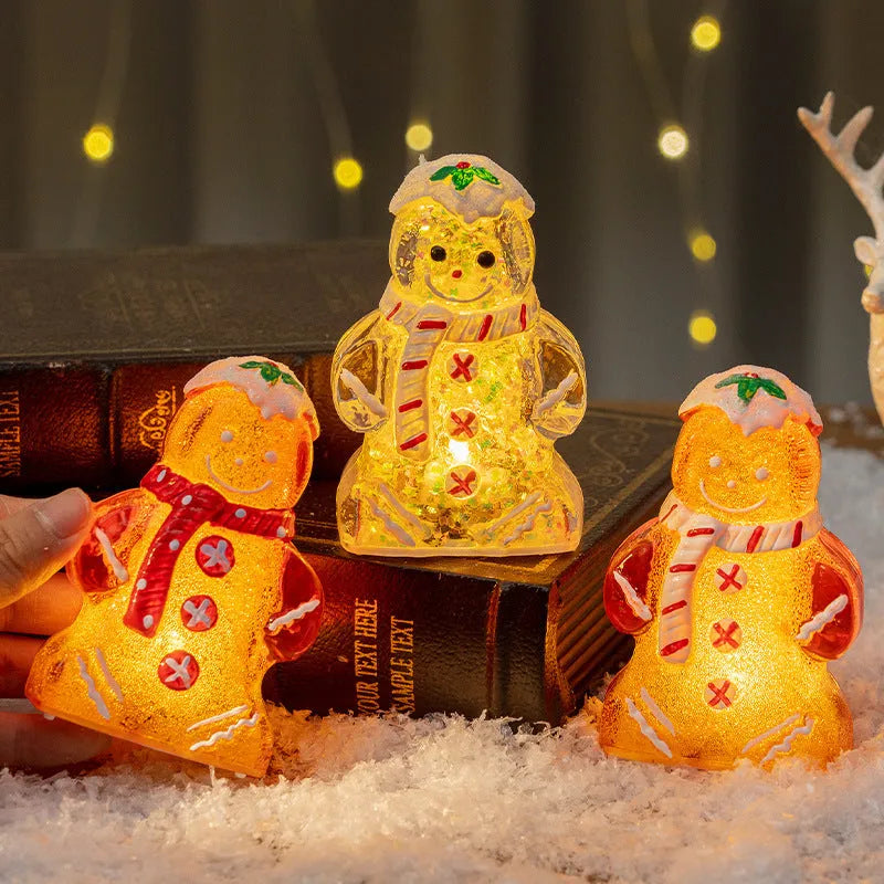 Glowing gingerbread man Christmas ornament with LED lights and red scarf