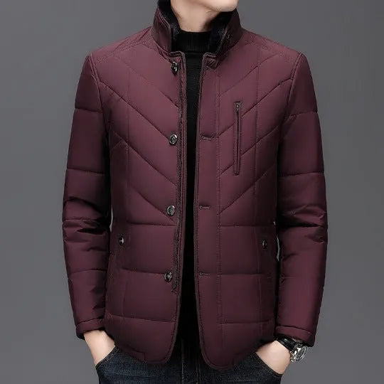 Men's solid colour short winter padded coat with side seam pockets, shown in dark blue.