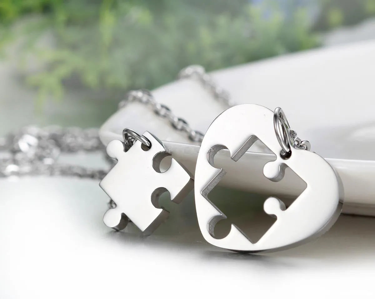 Stainless steel love puzzle pendant necklace for couples in silver finish – 52mm heart shape