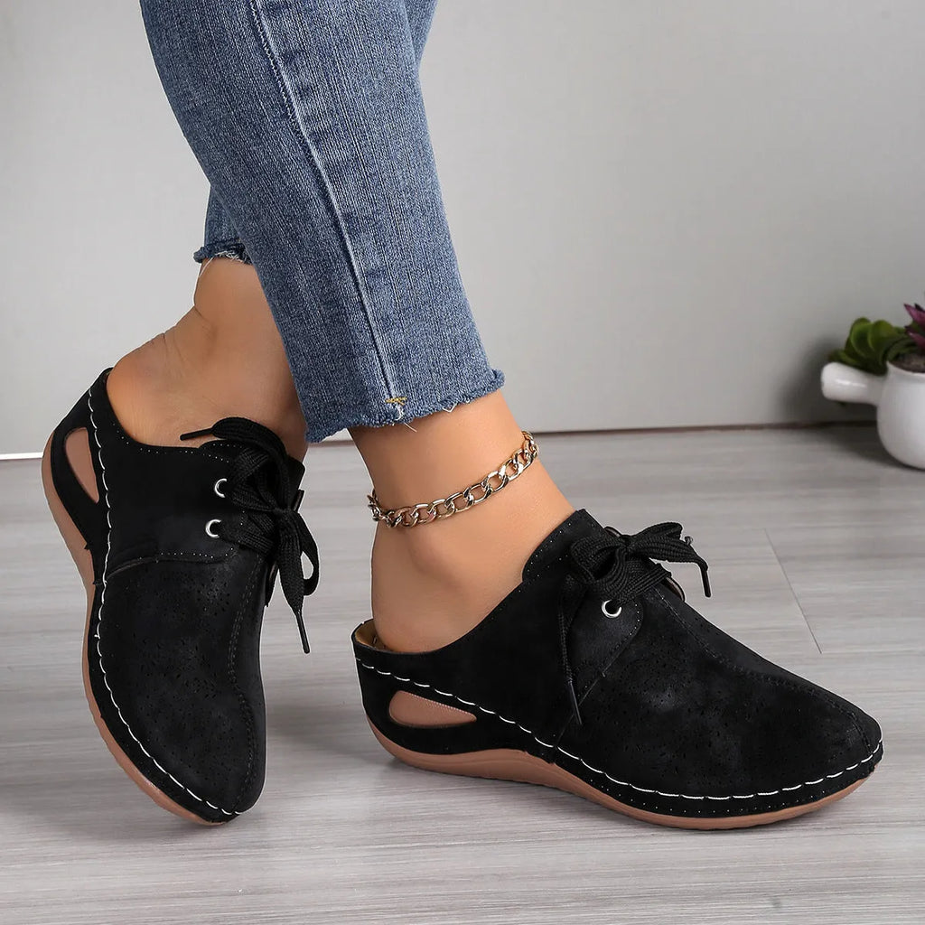 Women's light grey suede lace-up wedge slippers with a hollow-out rubber sole.