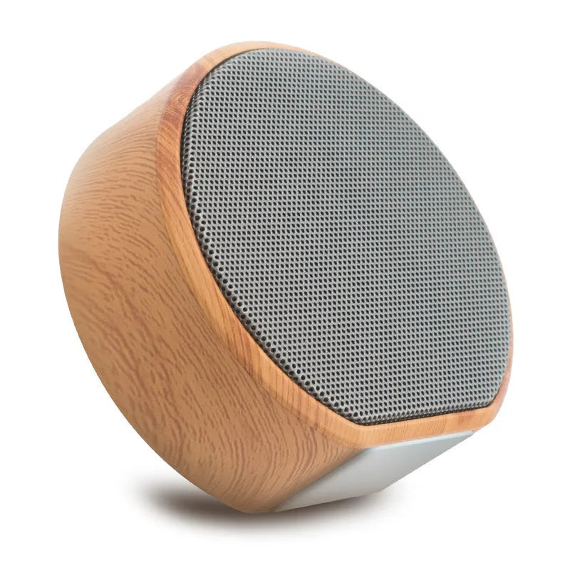 Wood grain Bluetooth speaker in white colour with built-in battery and USB interface