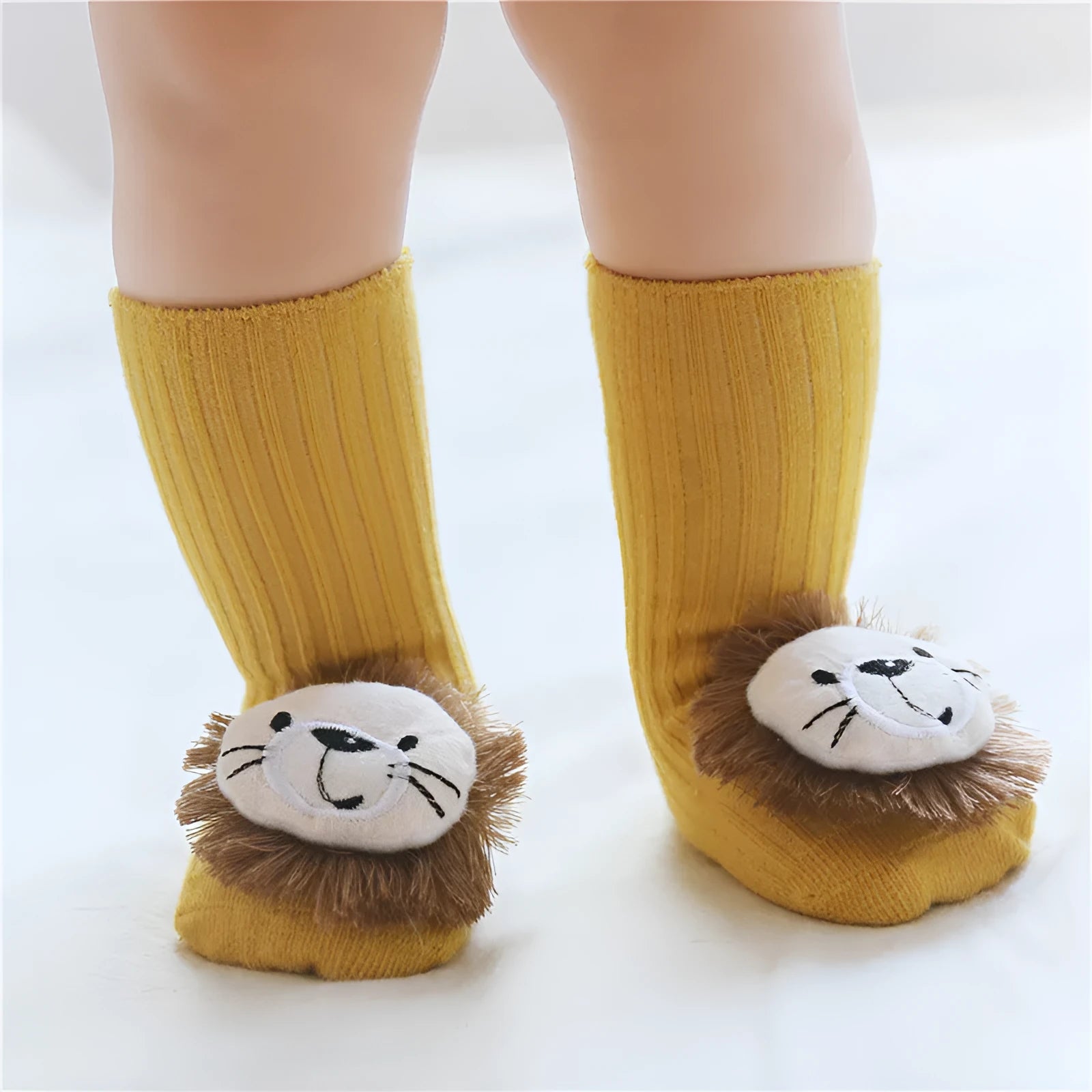 Cotton baby floor socks in multiple patterns including blue bow and lion designs