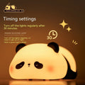Panda shaped night light with silicone construction showing clap activation feature and USB charging port
