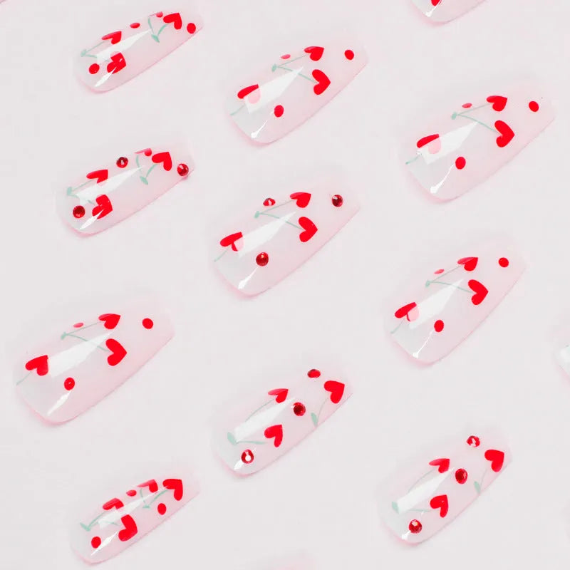Pack of JP1601 red diamond and small cherry design nail armour stickers with glue bottle