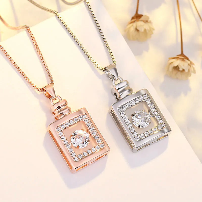 Sterling silver love heart pendant necklace with crown and bow design in rose gold and silver finish options