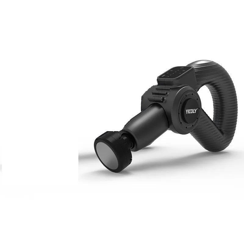 Black smart muscle massage gun with display, attached massage head, and additional heads on a table.