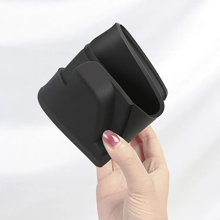 Black silicone car glasses case attached to Tesla Model 3 armrest box for sunglasses storage