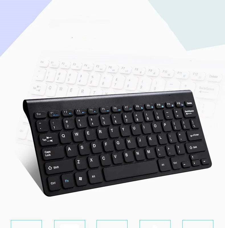 Black wireless keyboard and mouse set on wooden desk with USB receiver