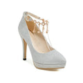 Blue women's platform stiletto heel with pointed toe on a plain background.