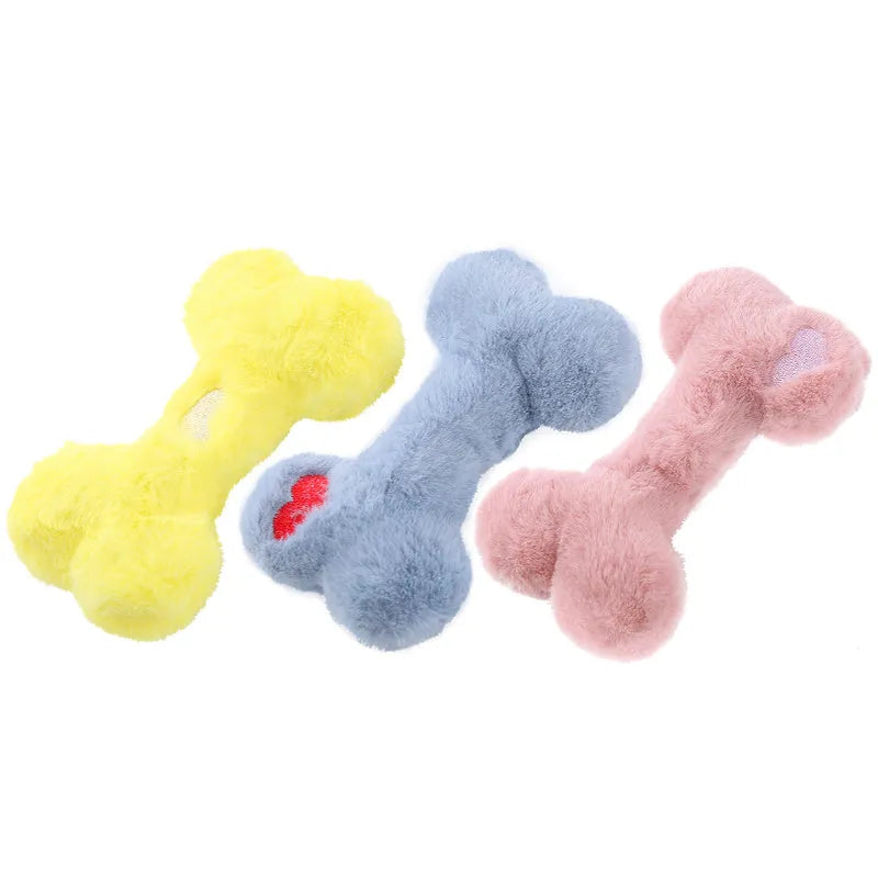 Blue plush bone dog toy with squeaker on a plain background.