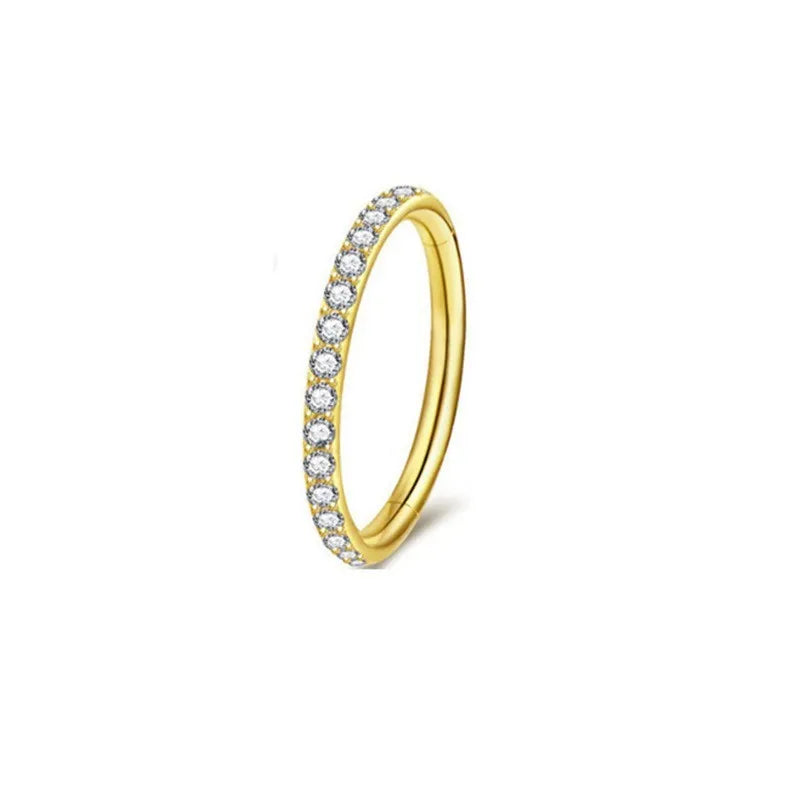 Stainless steel seamless nose ring with diamond front design in gold finish
