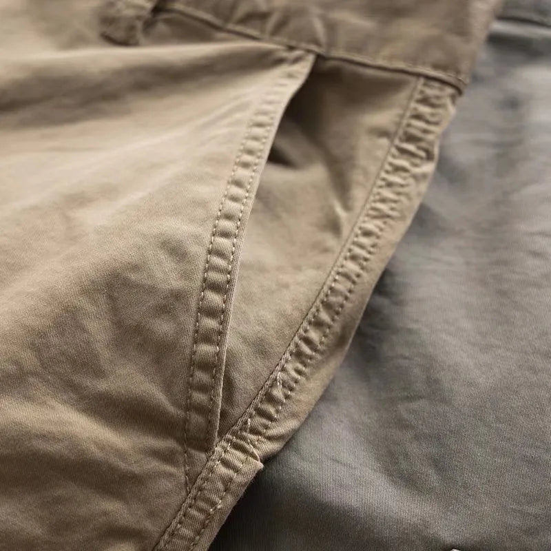 Men's cotton multi-pocket solid colour cropped work pants, available in black, blue, gray, khaki