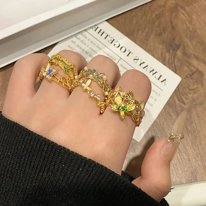 Creative Chinese butterfly women's copper ring with oil-dripping surface treatment in split ring design.